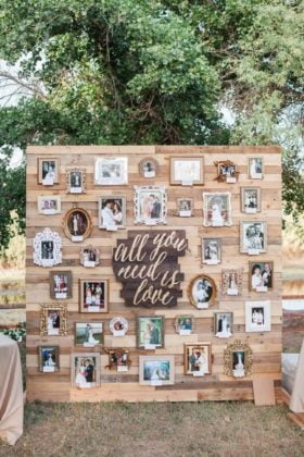 Pallet backdrop with couple photographs